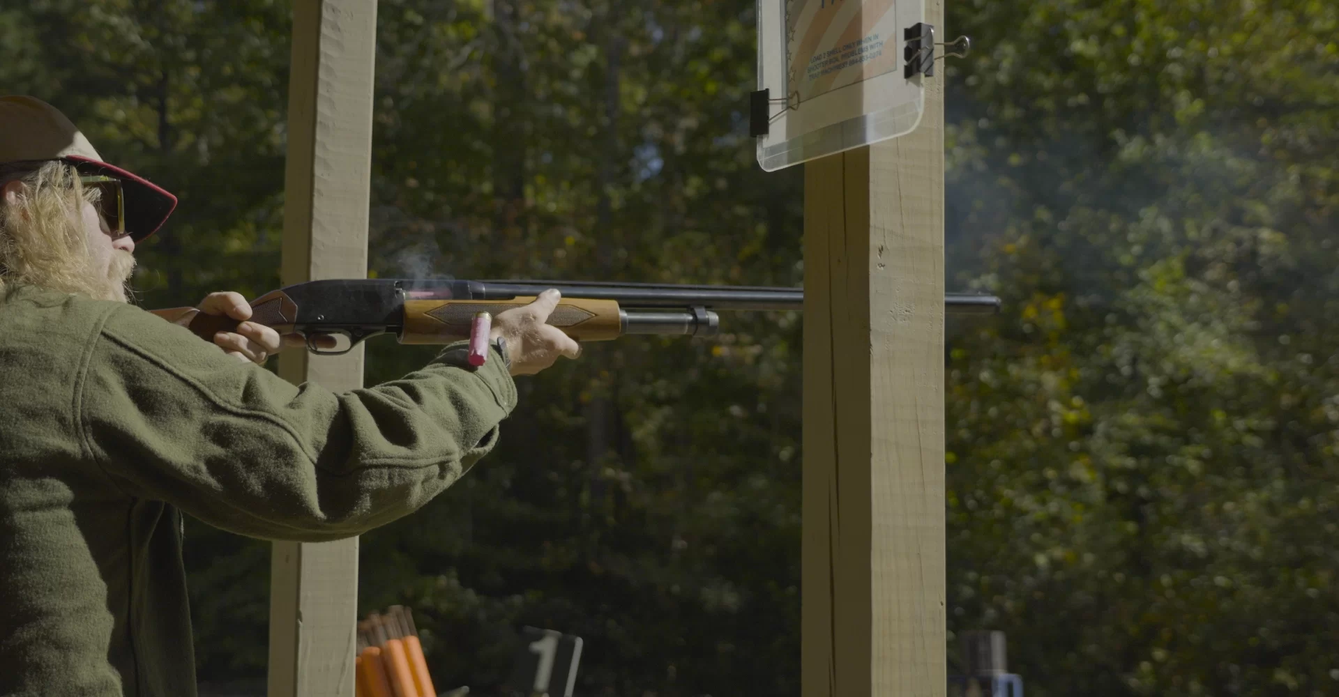person shooting disks at past Clays 4 Kids event