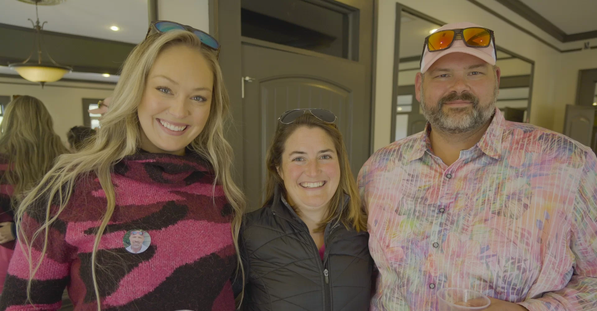 3 people at past Clays 4 Kids event