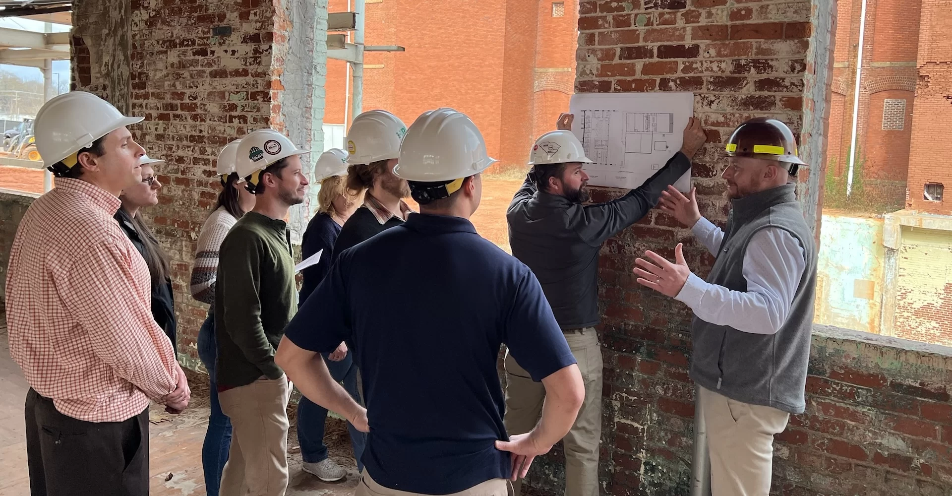 group of HRP employees in hardhats