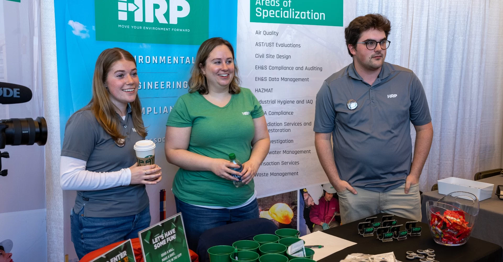 3 HRP employees at a convention