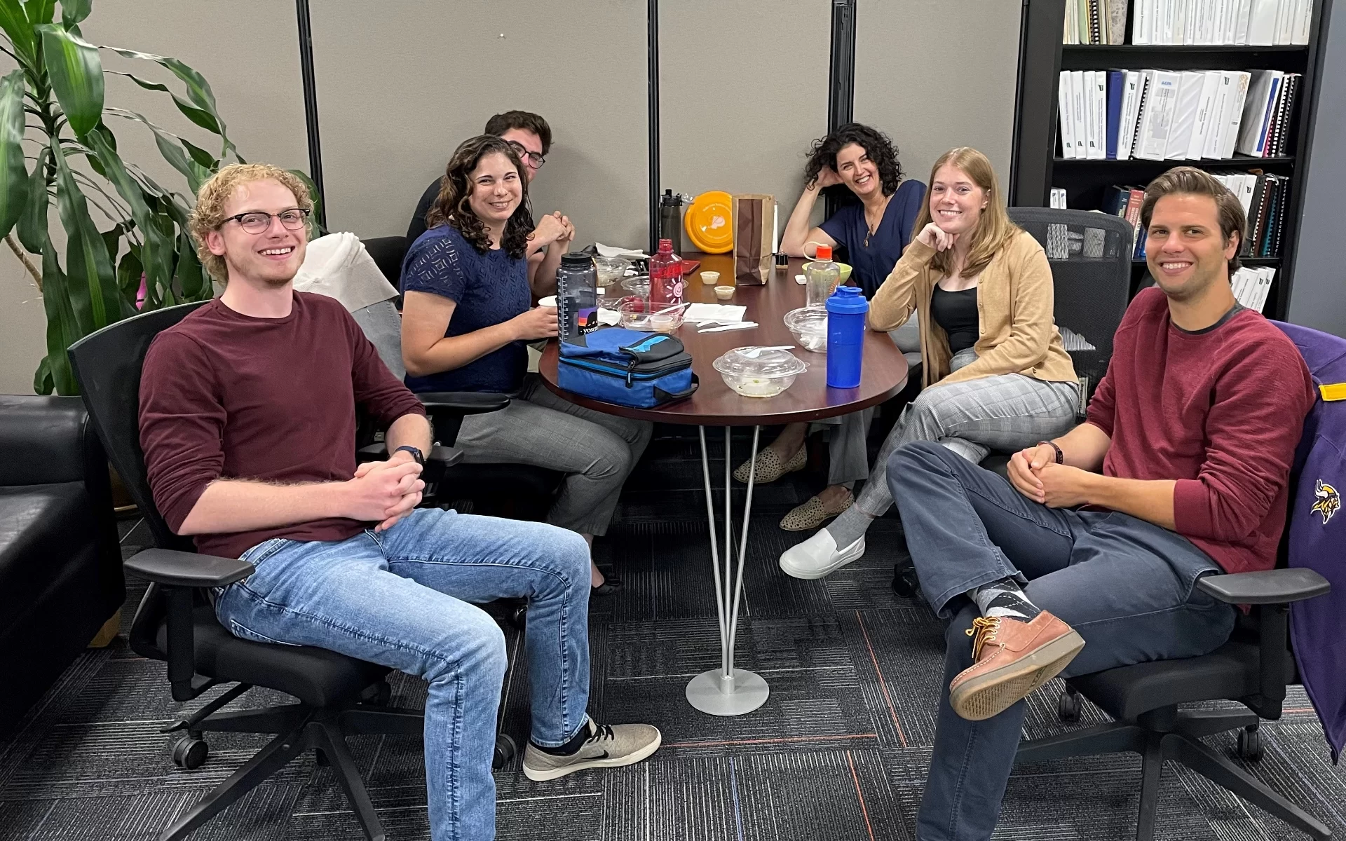 group of employees sitting in office