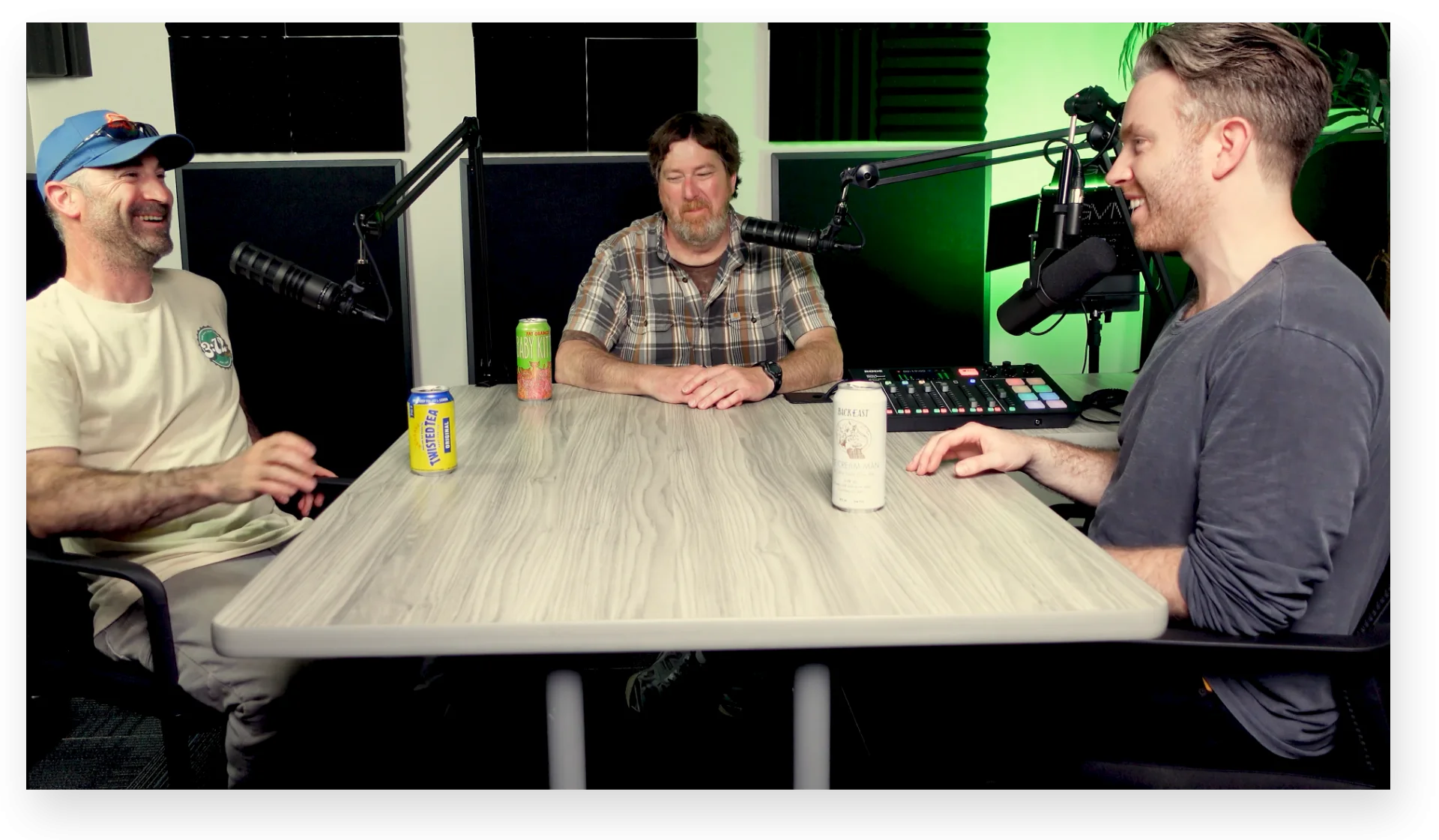 three HRP employees sitting at a table recording