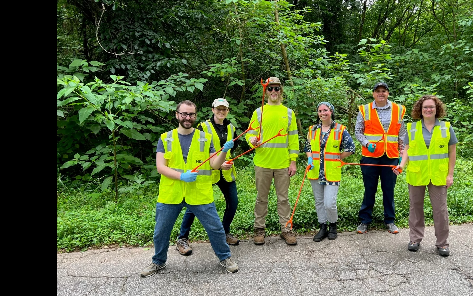 HRP employees cleaning up litter